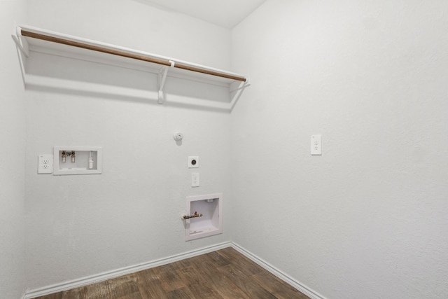 clothes washing area featuring washer hookup, dark hardwood / wood-style flooring, hookup for a gas dryer, and electric dryer hookup