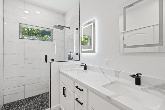 bathroom with vanity and an enclosed shower