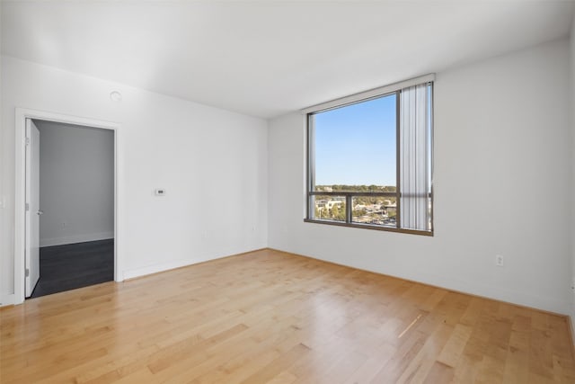 empty room featuring light hardwood / wood-style floors