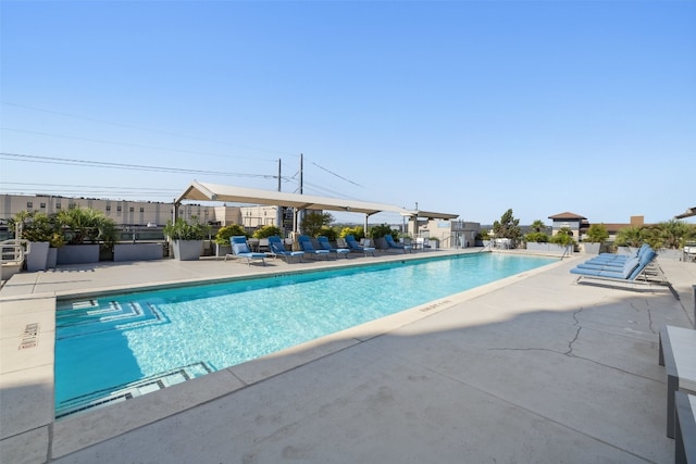 view of swimming pool featuring a patio