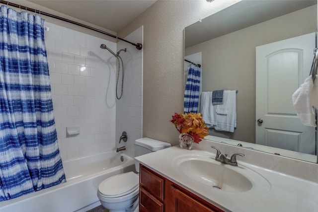 full bathroom with shower / bath combination with curtain, toilet, and vanity