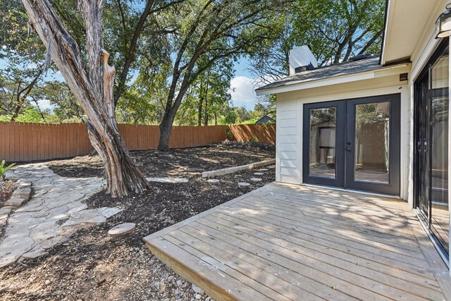 wooden deck featuring french doors