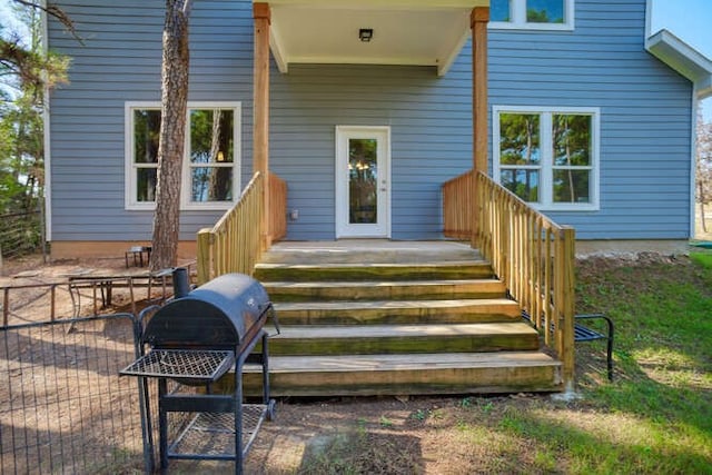 property entrance featuring a patio