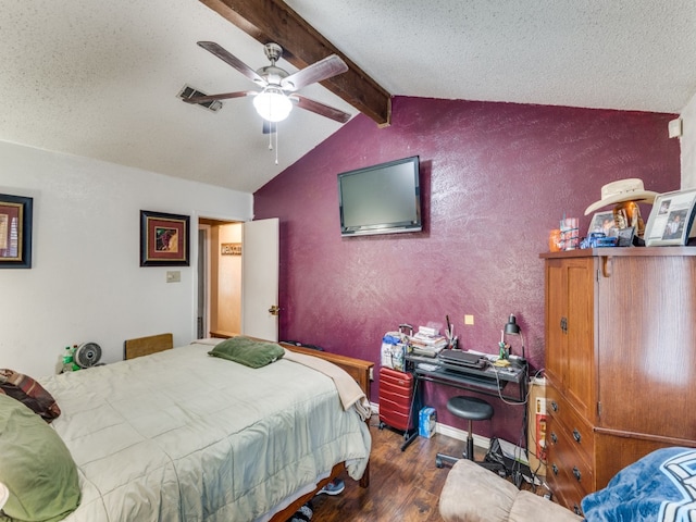 bedroom with vaulted ceiling with beams, dark hardwood / wood-style flooring, a textured ceiling, and ceiling fan