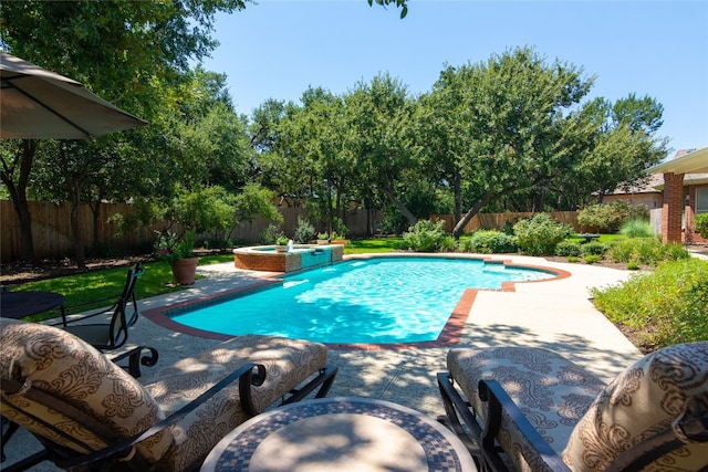 view of pool featuring an in ground hot tub and a patio