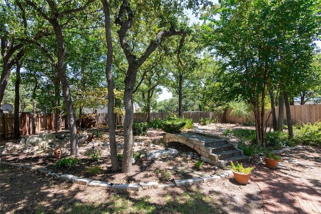 view of yard featuring a fenced backyard