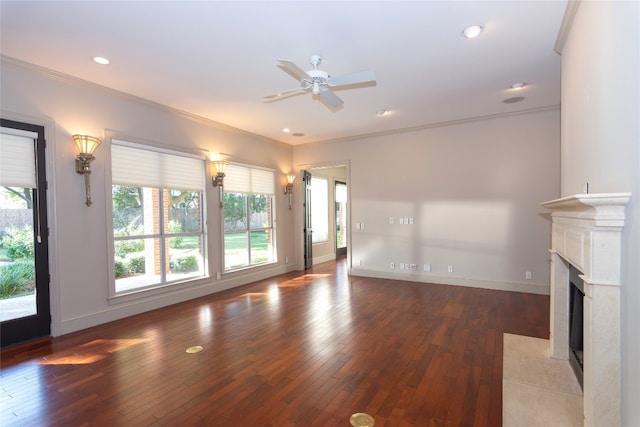 unfurnished living room with wood-type flooring, crown molding, and ceiling fan