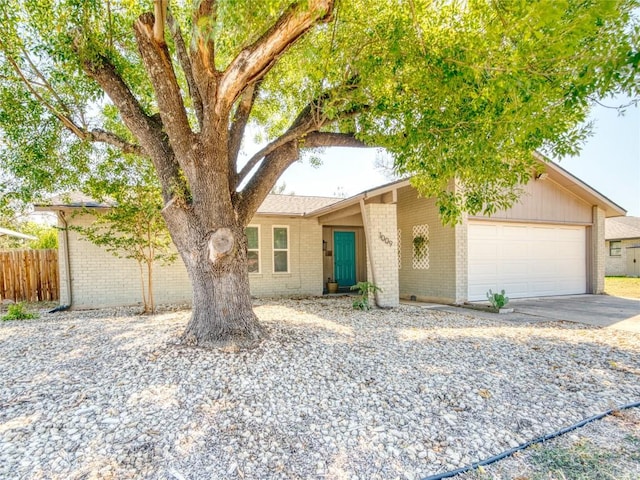 ranch-style home with a garage