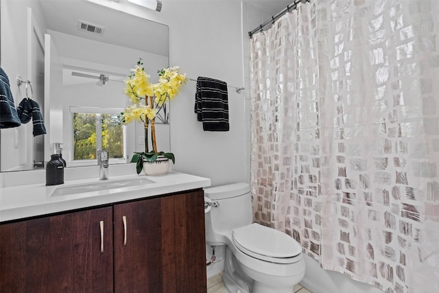 full bathroom featuring vanity, toilet, and shower / bath combo with shower curtain