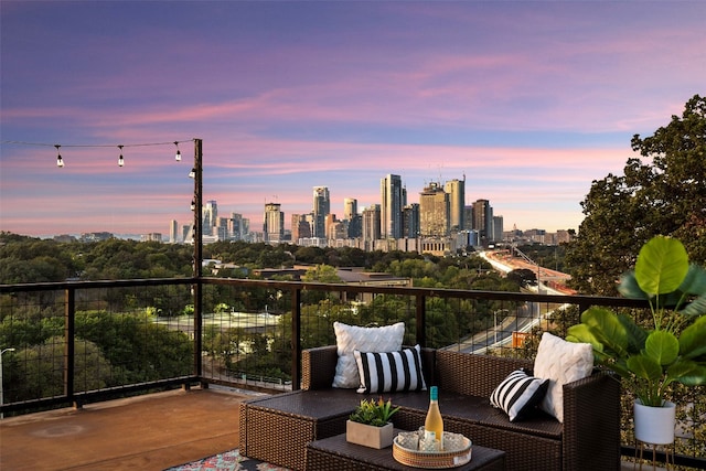 view of balcony at dusk