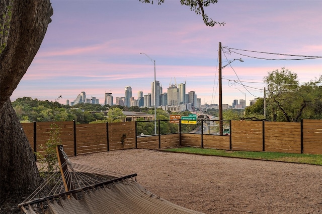 view of yard at dusk