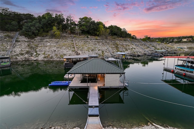 view of dock with a water view