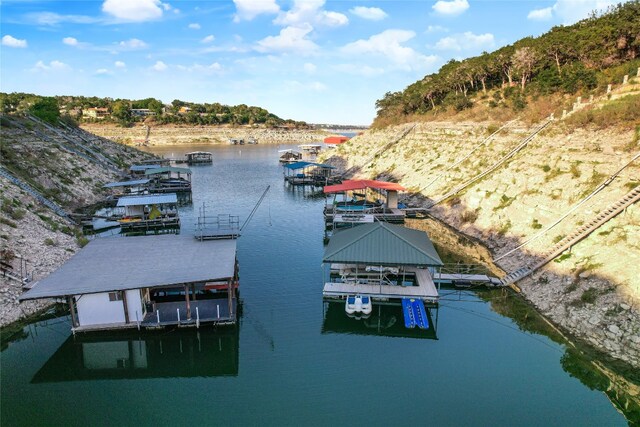 dock area featuring a water view