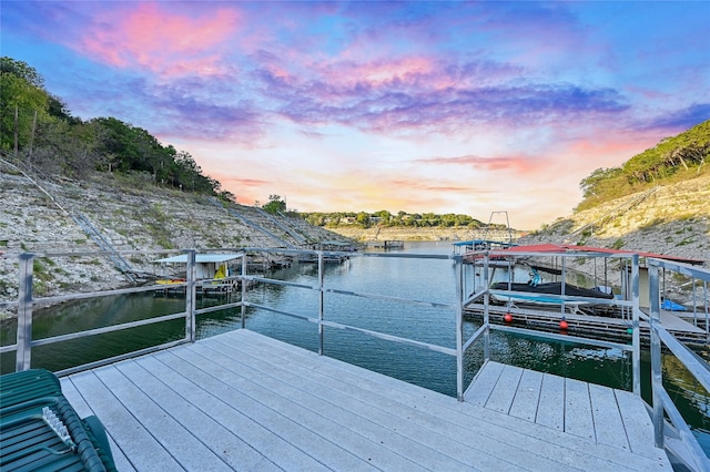 view of dock featuring a water view and boat lift