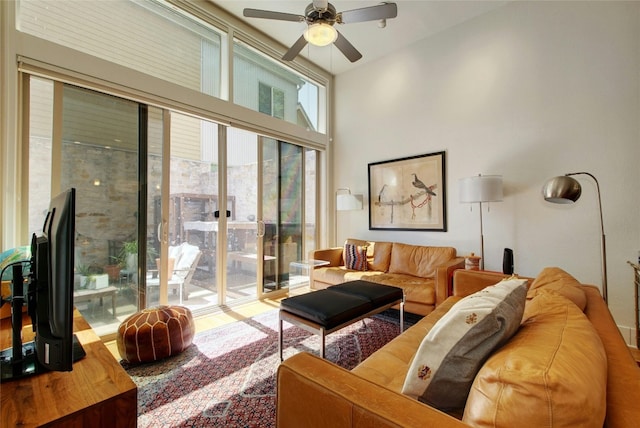 living room featuring ceiling fan