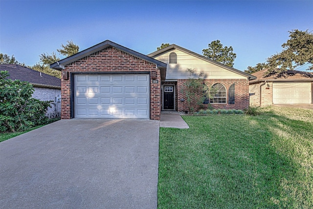 ranch-style house with a garage and a front lawn