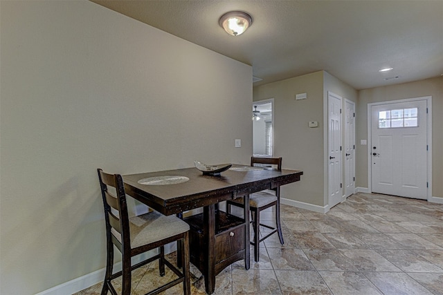 dining area featuring ceiling fan