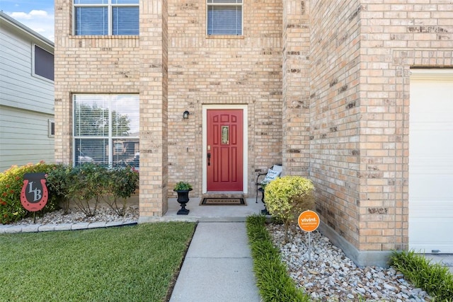 property entrance with a garage