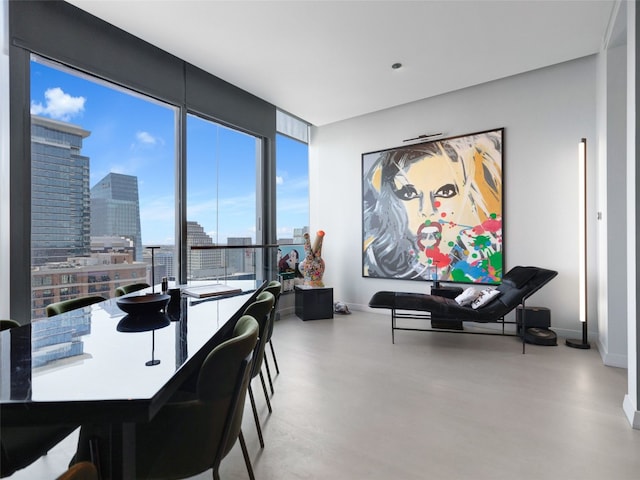 dining space with hardwood / wood-style flooring