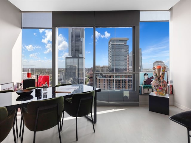 dining space with expansive windows