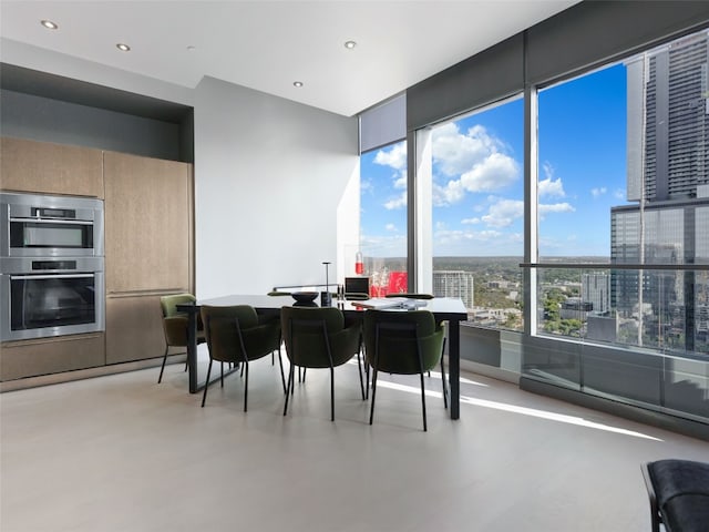 dining room featuring concrete flooring