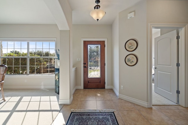 entryway featuring light tile patterned floors