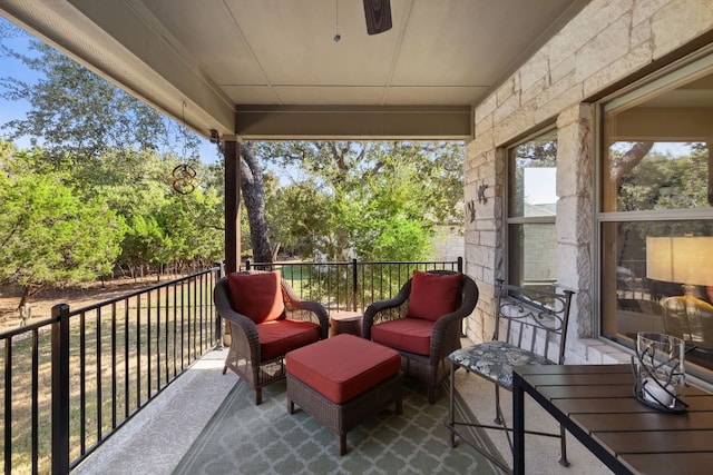 exterior space with ceiling fan