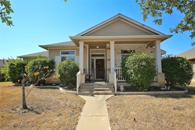 view of front of home featuring covered porch