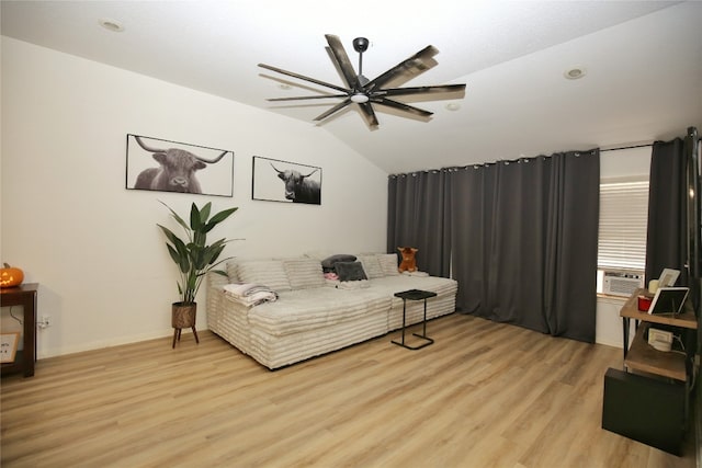 bedroom with light wood-type flooring, cooling unit, ceiling fan, and lofted ceiling