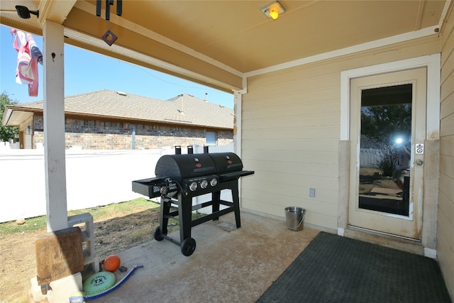 view of patio featuring a grill