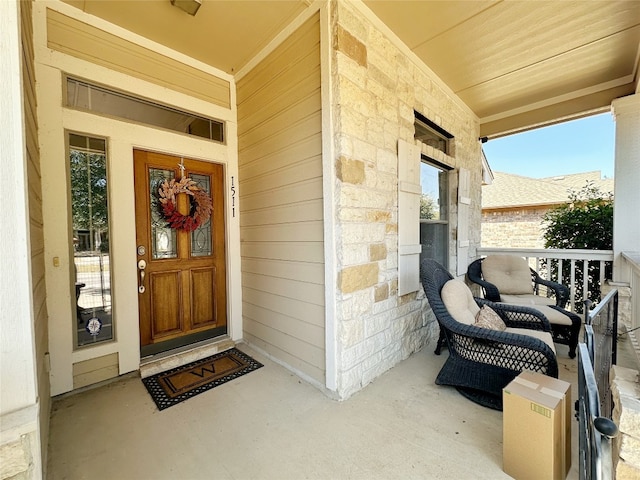 property entrance featuring covered porch