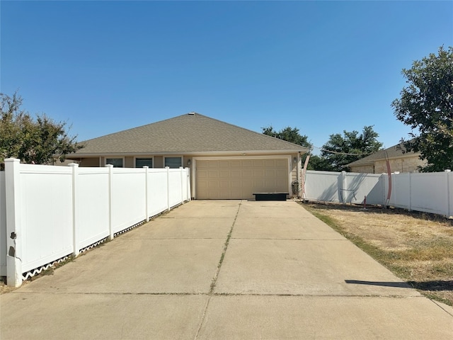 exterior space with a garage