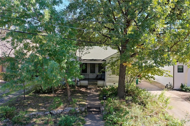 obstructed view of property featuring a porch