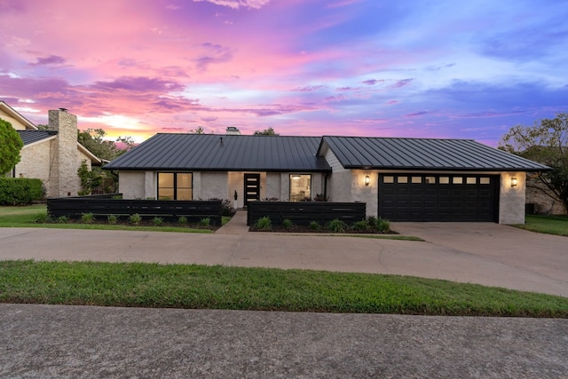 modern farmhouse style home with a garage