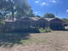 view of front of home with a front yard