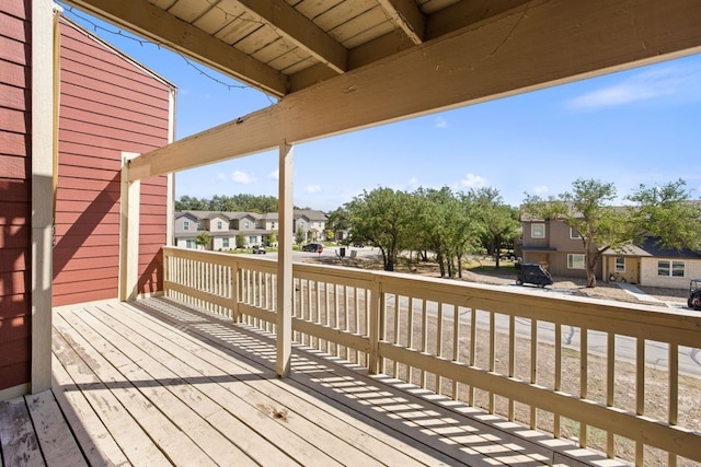 wooden deck featuring a residential view