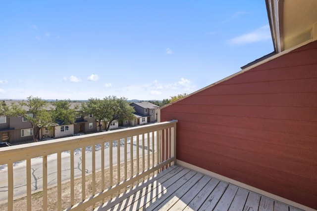 505 Demarett Dr Unit 12, Point Venture, TX 78645 - wooden deck with a residential view