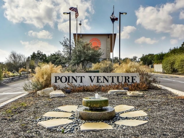 view of community sign