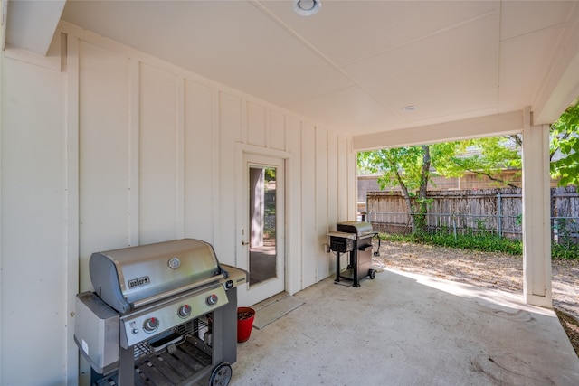 view of patio featuring a grill