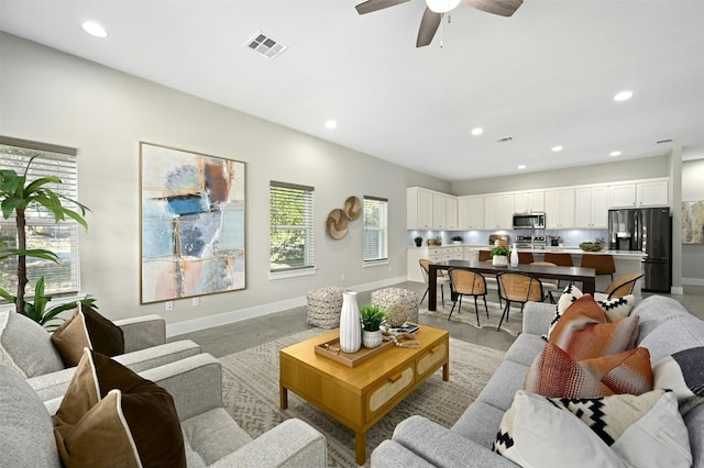 living room with ceiling fan