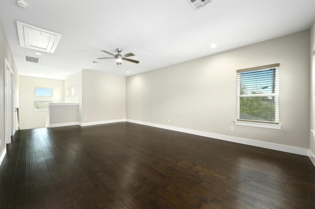 unfurnished room featuring ceiling fan and dark hardwood / wood-style floors