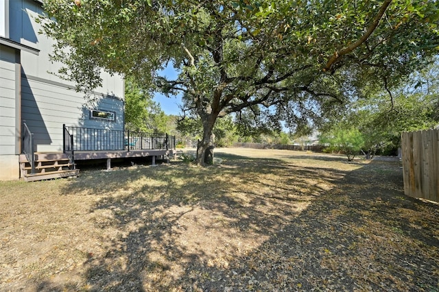 view of yard with a deck