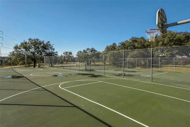 view of basketball court with tennis court