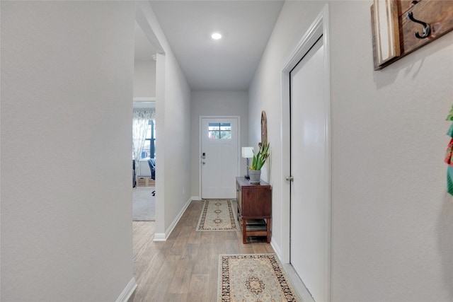 hall featuring light hardwood / wood-style flooring