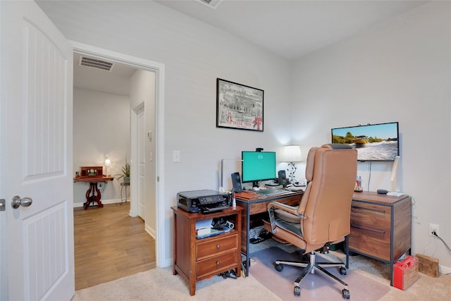 office space featuring light hardwood / wood-style floors