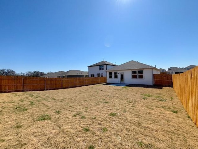 239 Hidalgo Ln, Elgin, TX 78621 - rear view of property with a patio area