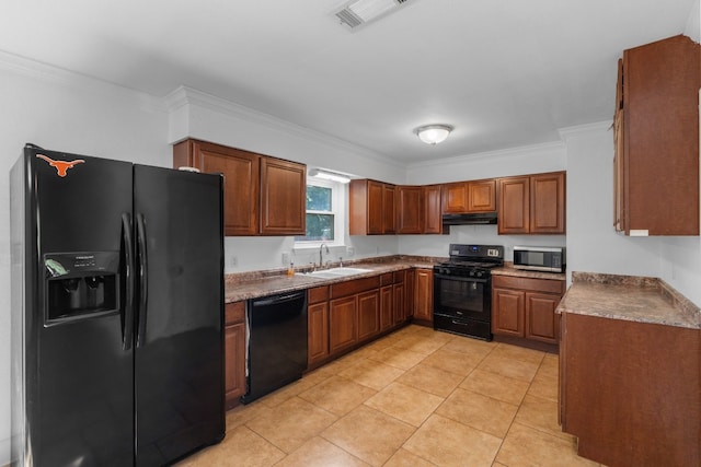 kitchen featuring crown molding, black appliances, sink, and light tile patterned floors