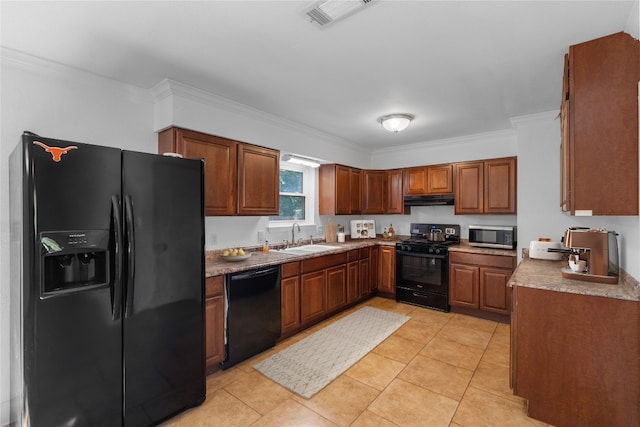 kitchen with ornamental molding, black appliances, sink, and light tile patterned floors