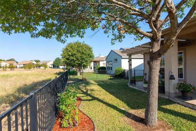 view of yard with a pergola