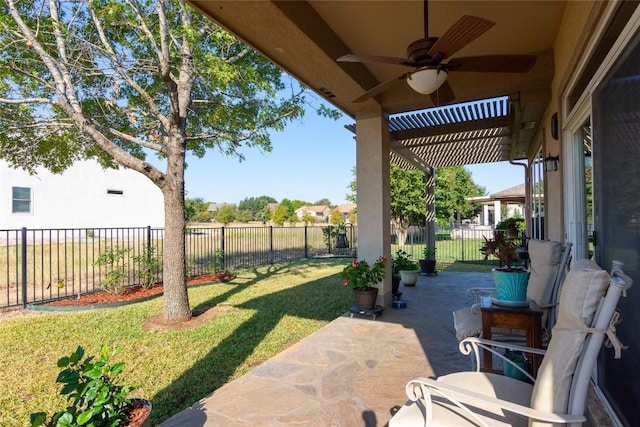 view of patio featuring a pergola and ceiling fan